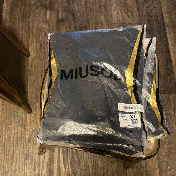 Elegant black dress with flattering ruffle
detail front and over one shoulder. - Picture 4 of 4